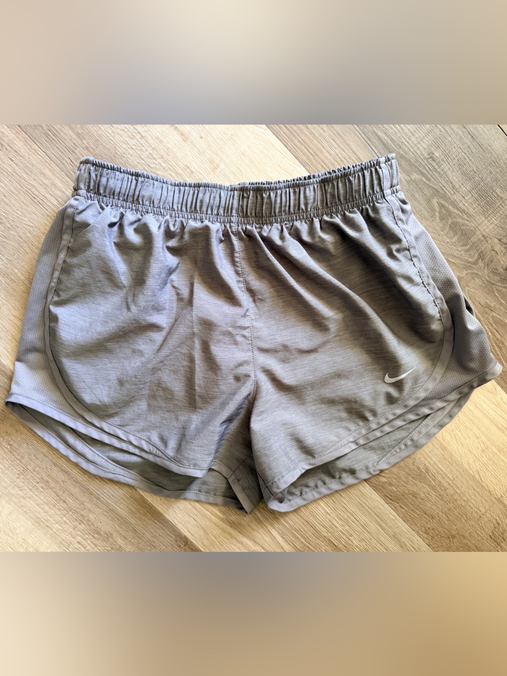 Nike Women's Light Gray Athletic Shorts with Swoosh
